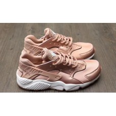 Nike Air Huarache gold rose